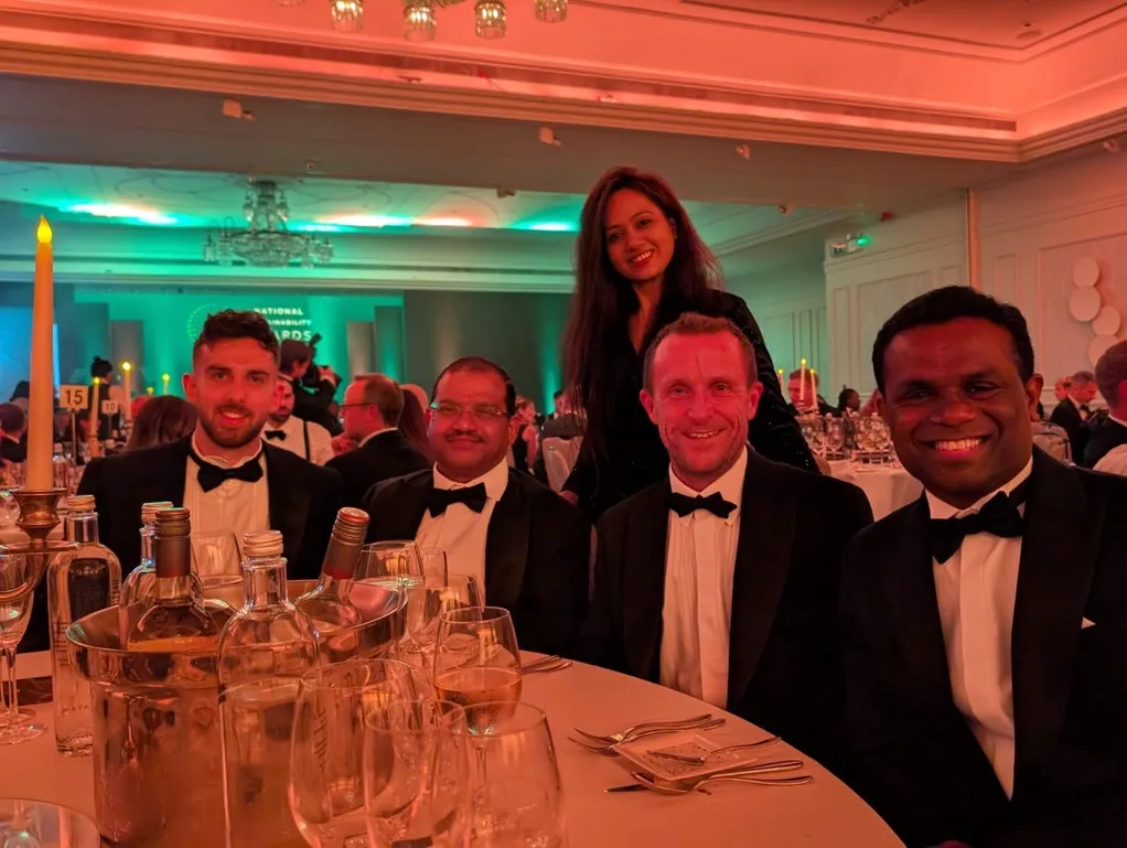 Medicom Healthcare team receiving sustainability recognition